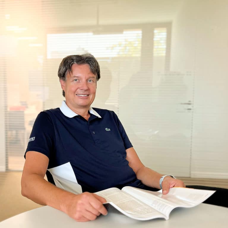Marc Pfister sitting at the table